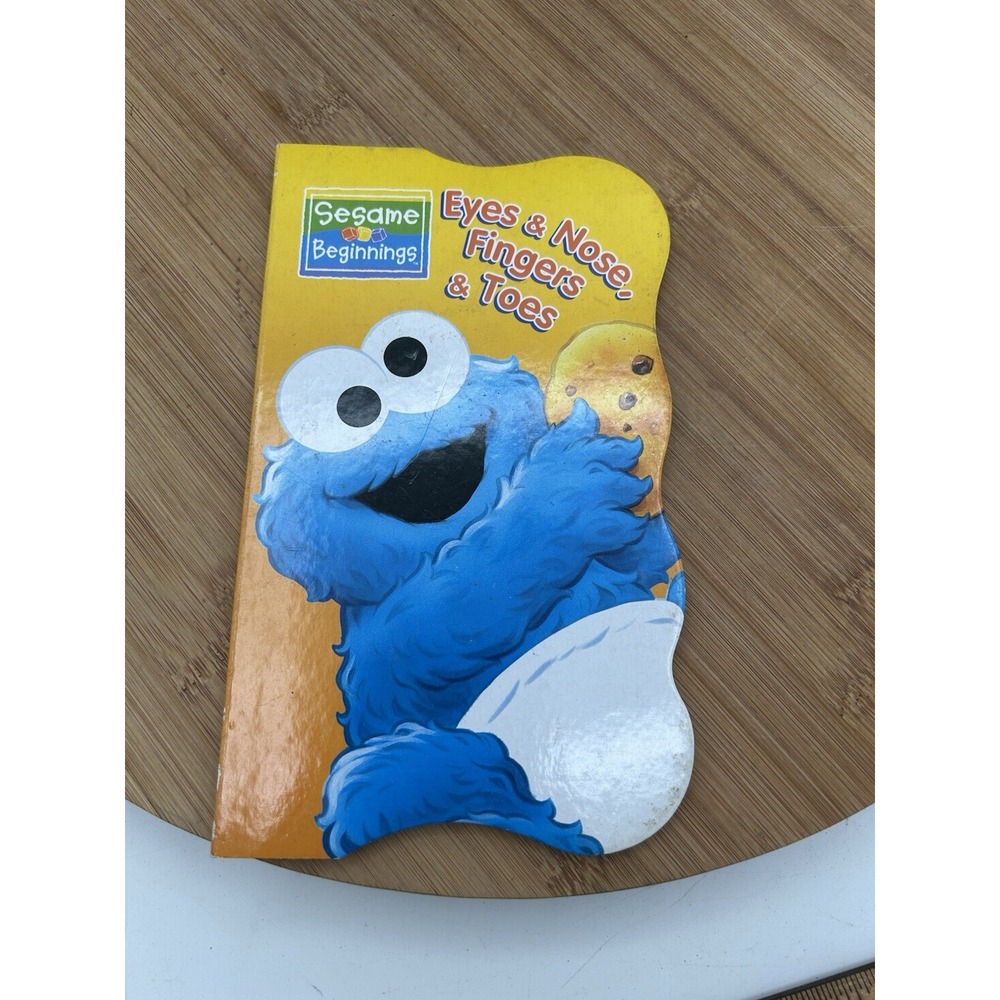 Sesame Beginnings Eyes & Nose, Fingers & Toes Board Book Cookie Monster